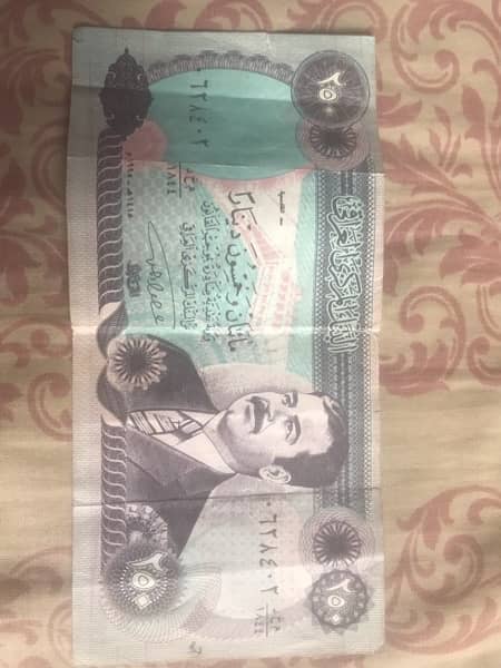 250 Dinar of iraq. With saddam hussain pic 1