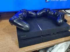 PlayStation 4 (PS4) with 2 controller for sale