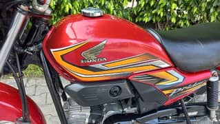 Honda pridor 100cc red color registration all Punjab