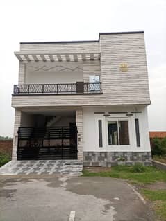 5 Marla Double Story Brand New House For Sale In Model City 1, B Block, Faisalabad.