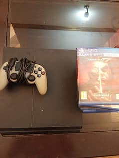 PS4 1 TB slightly used with 1 controller and 9 games