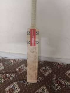 ca 2000 cricket bat with gray Nicolas sticker