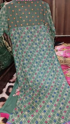 full embrioded gaown dress in good condition.