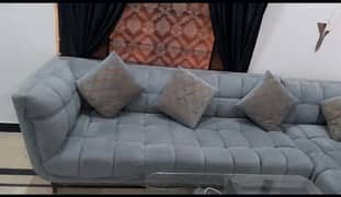 L shaped sofa set with dinning style table in grey colour