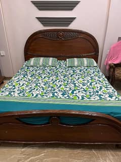 Pure wooden bed made by the strongest wood in Pakistan 100percent ok