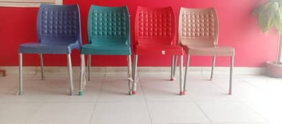 Plastic chairs and table 0