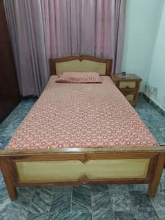 Oak Single bed with mattress and a sidetable