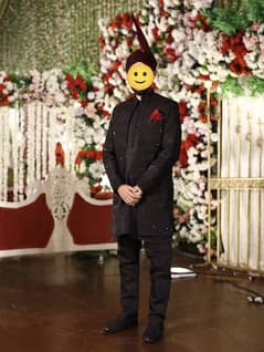 black Sherwani with red kulla CUTS Brand