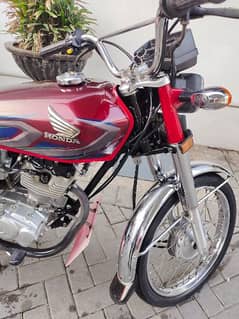 Honda 125 model 22 lahore number bike Islamabad available