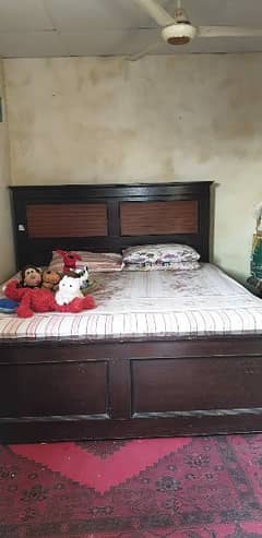 King size bed with two side tables, mattress and a chinioti couch