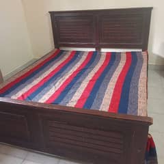 queen size bed with side tables