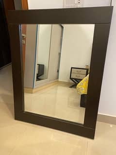 mirror with dark wood frame