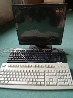 FUJITSU monitor +2 keyboards in good condition