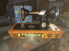 Poonam Sawing machine