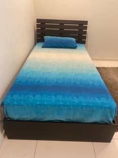 single bed wooden from inter wood,10/10 condition with mattress.
