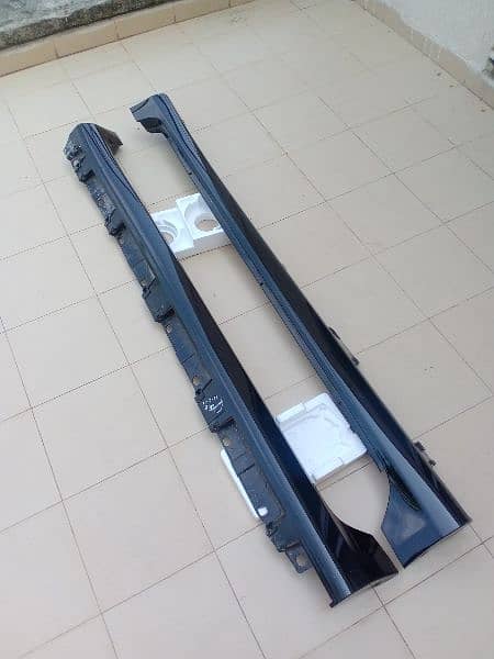 2009 to 2015 Toyota corolla Xli Gli oem factory side skirts (black) 0