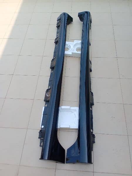 2009 to 2015 Toyota corolla Xli Gli oem factory side skirts (black) 2