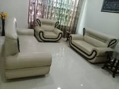 six seater sofa and  dining table with six chairs with top glass