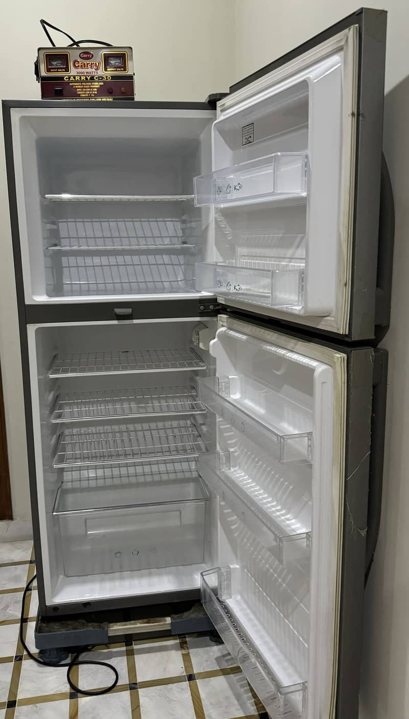 Haier Refrigerator hrf 306 medium size 2