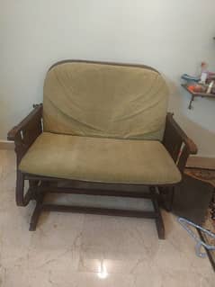 wooden rocking chair with poshish