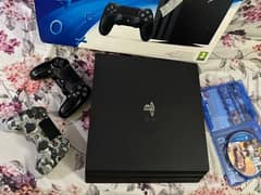 Ps4 pro 1tb with 2 controllers and gta v