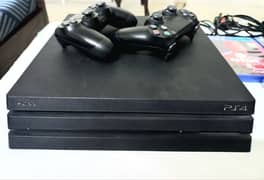 PlayStation 4 Pro/ PS4 Pro 1TB with 2 controllers, bag, games