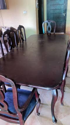 Dining table with 8 chairs . . . . .