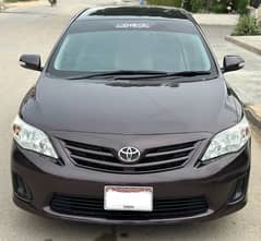 Toyota corolla 2013 throughout petrol driven registered on my name