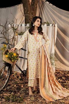 3 Pcs Women's Stitched Printed Suit
Lawn Suit