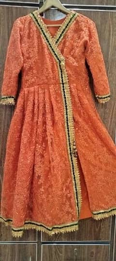 Orange color Angrekha stitch frock