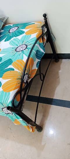 2 single wrought iron bed