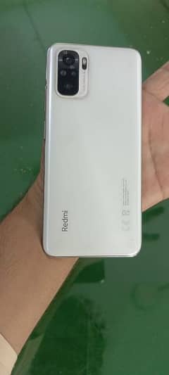 Redmi note 10 with original charger and box