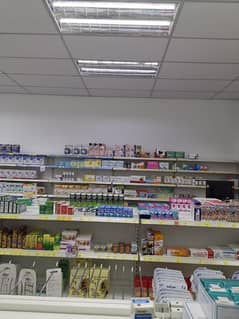 running pharmacy for rent in johar town very hot location profitable setup on main road good location good parking area