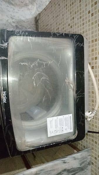 fully automatic 8kg haier washing machine Model number (HWM85-826) 1