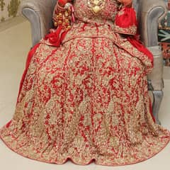 Bridal lehnga blood red colour. Large flare lehnga with peplum