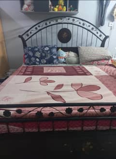 Rought iron King size bed with mattress is for sale