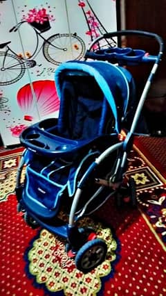 baby pram with cot for sale