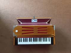 A brand new harmonium is for sale