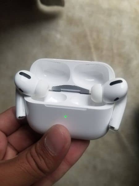 Airpods pro with wireless charging case made in Japan. 0