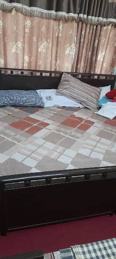 2 single beds with matress and one side table