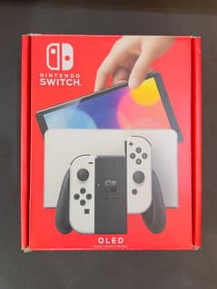 Nintendo Switch OLED (Used for a few months) Excellent condition.