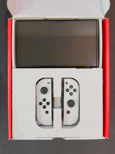 Nintendo Switch OLED (Used for a few months) Excellent condition 10/10 2