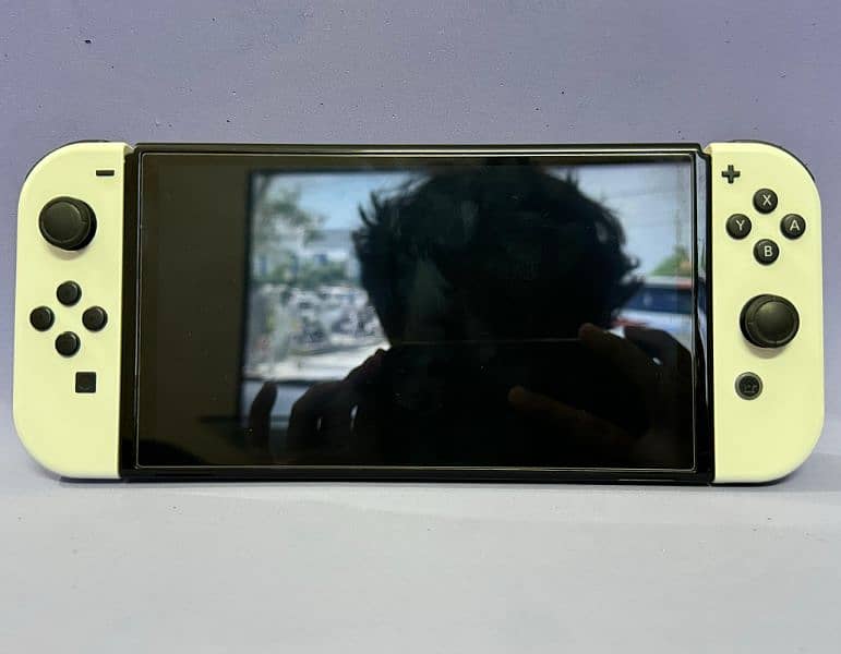 Nintendo Switch OLED (Used for a few months) Excellent condition 10/10 7