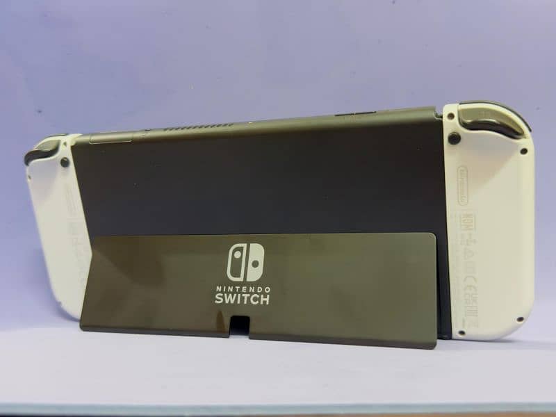 Nintendo Switch OLED (Used for a few months) Excellent condition 10/10 8