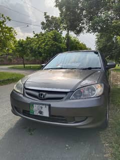 Honda Civic 2003/2004. Eagle shape. Well maintained. Details are below