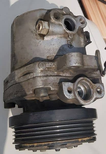 WAGONR AC COMPRESSOR 2