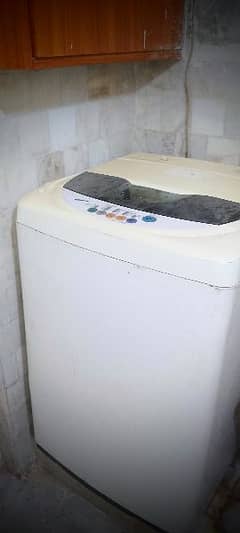 LG automatic washing machine with dryer.