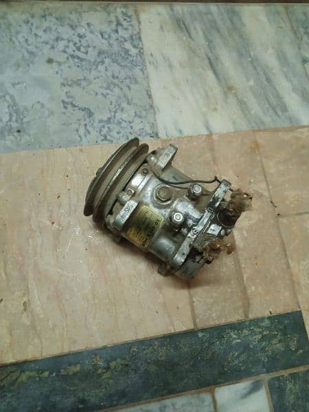 Ac Compressor . . . 1