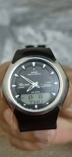 Casio wave ceptor n Nixon watch