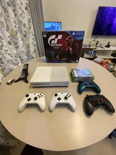 Xbox One S  1TB with  2 controllers + Free charging dock and 4 Games